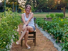 courtney sitting in a garden