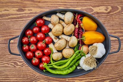 a collection of vegetables in a skillet