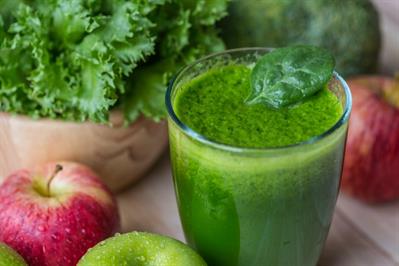 Vegetarian Juice and fruits on table